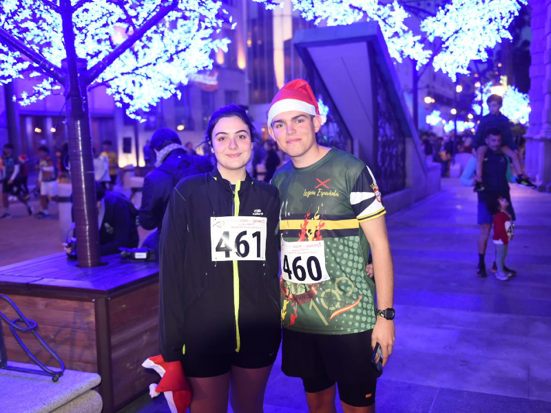 Una pareja de corredores, antes de despedir el año de la forma más atlética posible